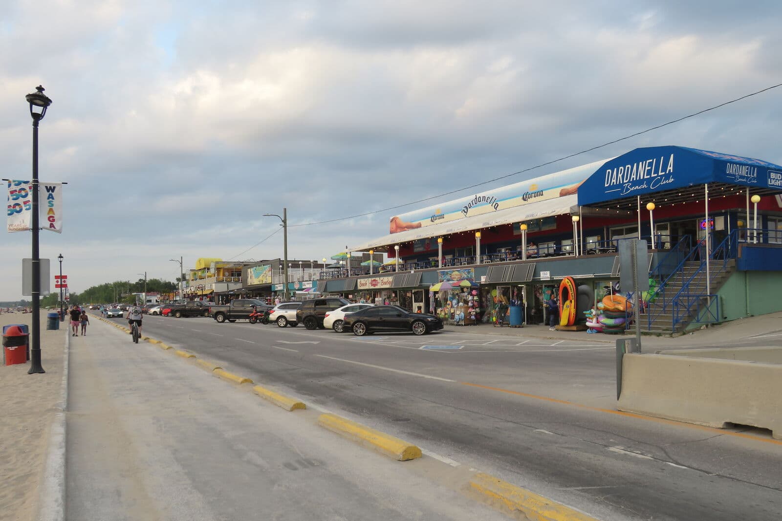 The beachfront strip at Beach Area One, with shops and the Dardanella along the street